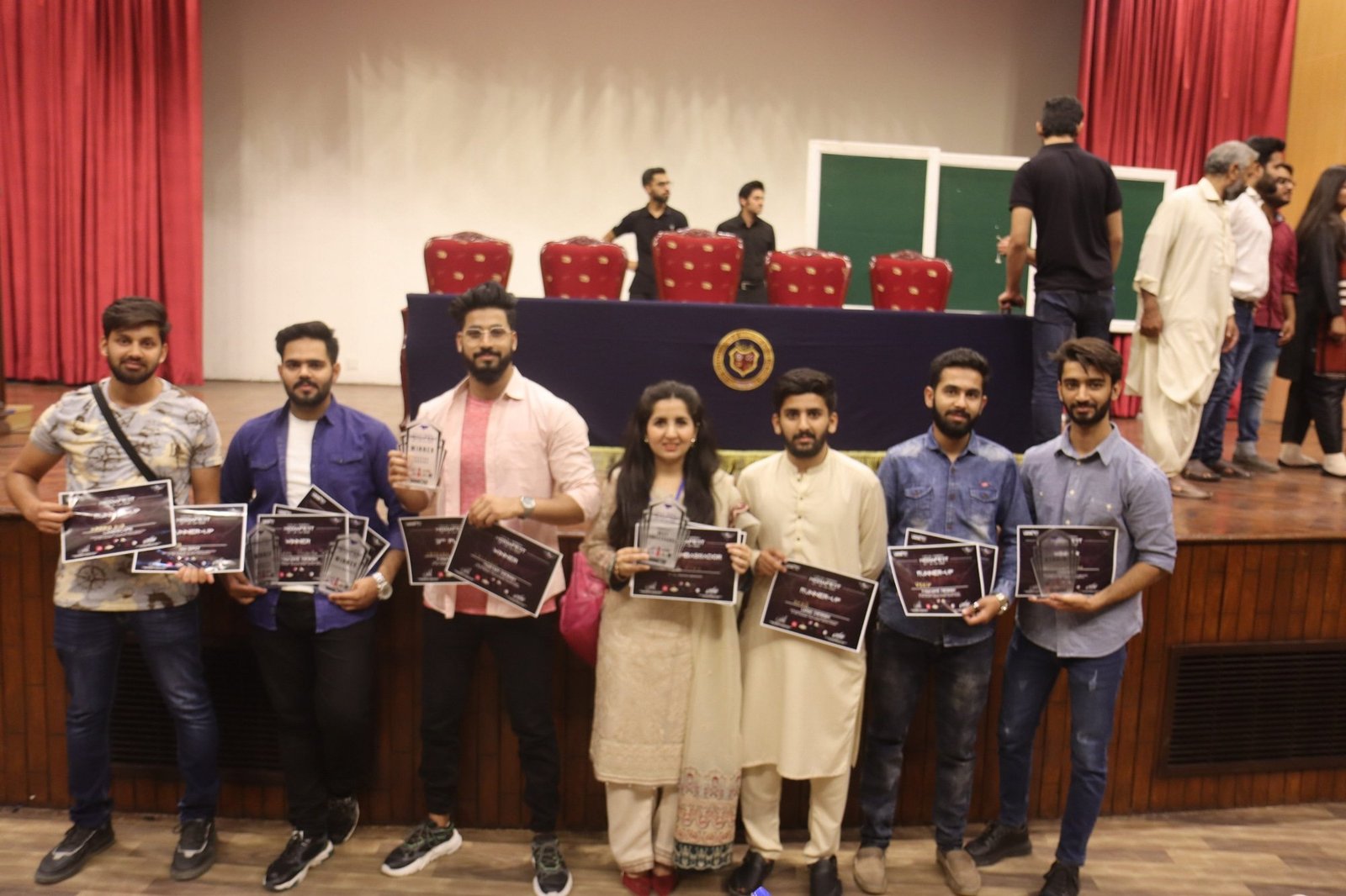 BIMS students receiving awards â€” merit-based scholarship